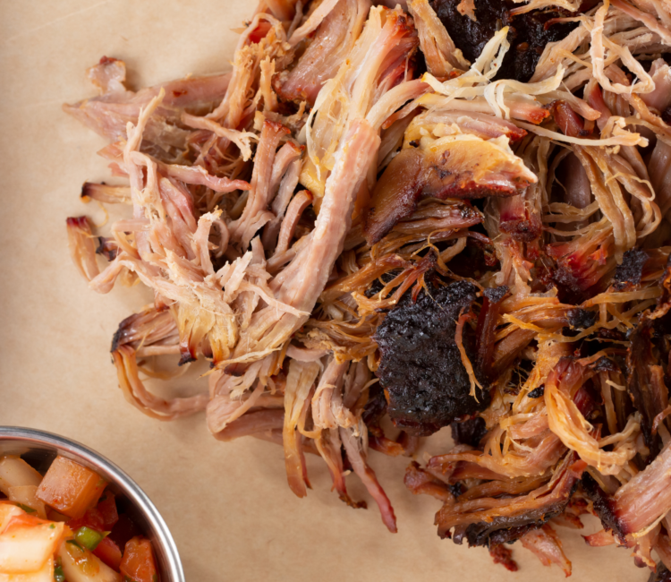 pile of smoked pulled pork with burnt ends